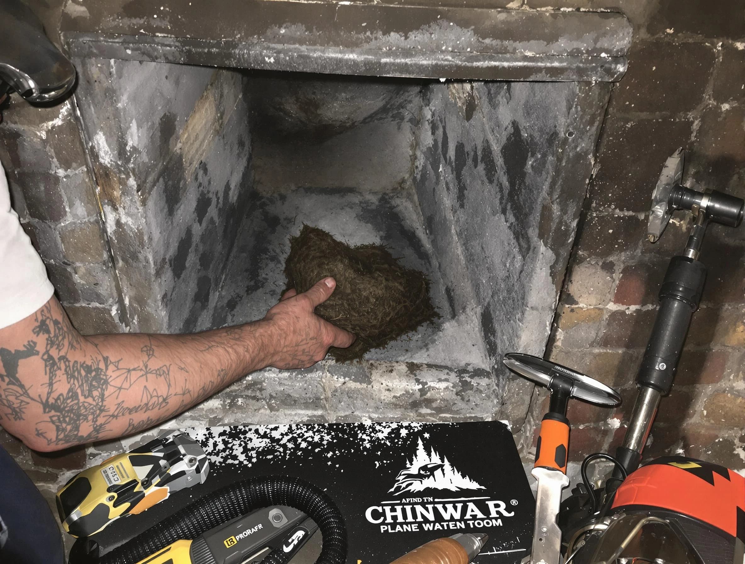 Stafford Chimney Sweep safely removing debris and screening chimney in Stafford, NJ